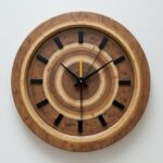 Wood Clock with Concentric Rings Design and Black Hands